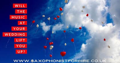 red and white balloons floating up in the air